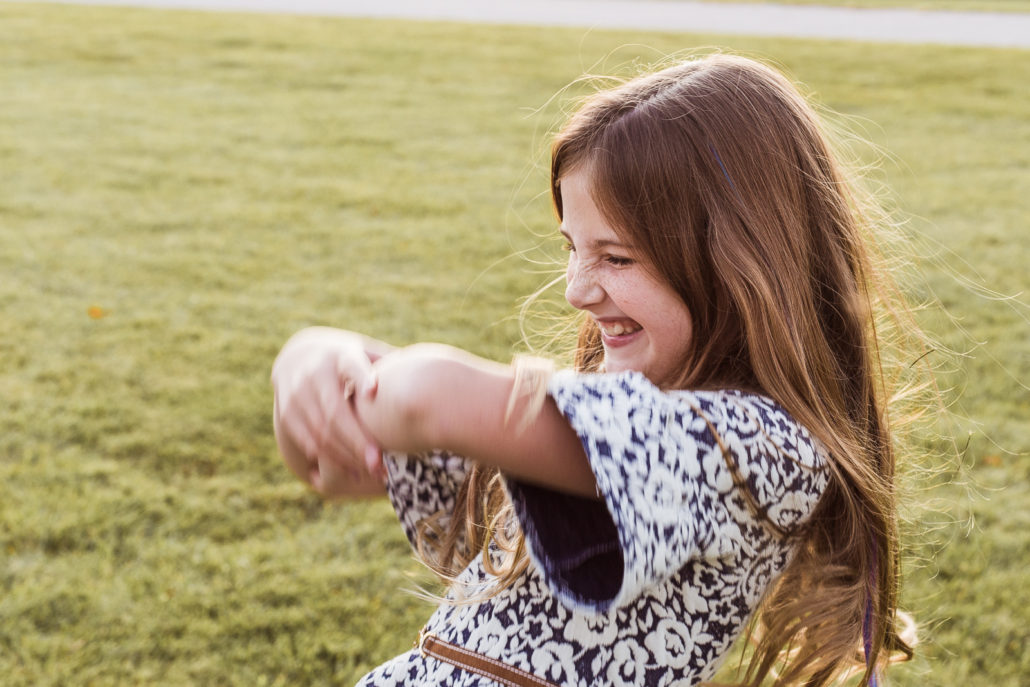 carefree-daughter-tween-laughing-portrait-waunakee-wisconsin