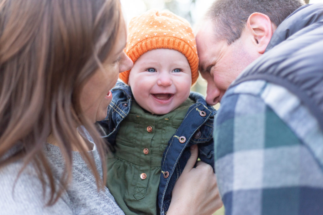 mom-and-dad-doting-on-toddler-family-photography-deforest-wisconsin